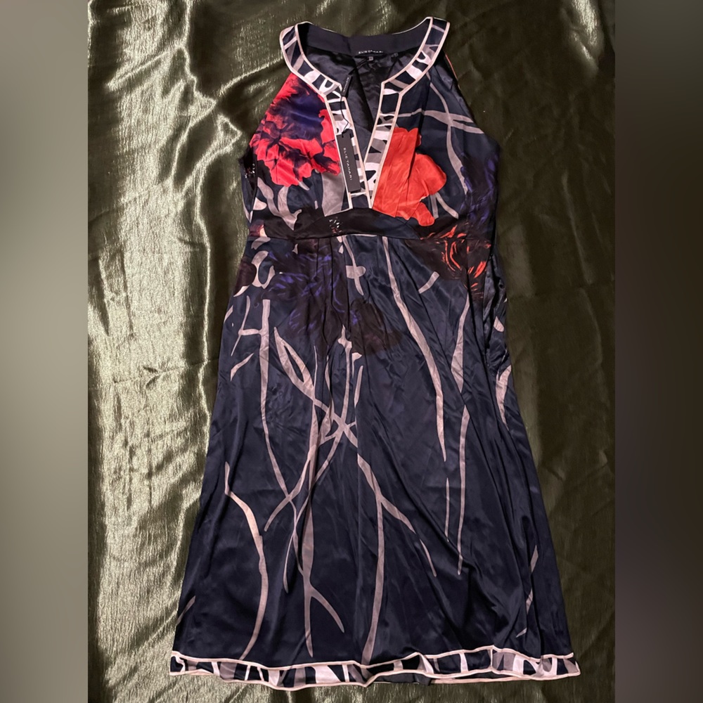 Silk material, purple with poppy flowers.